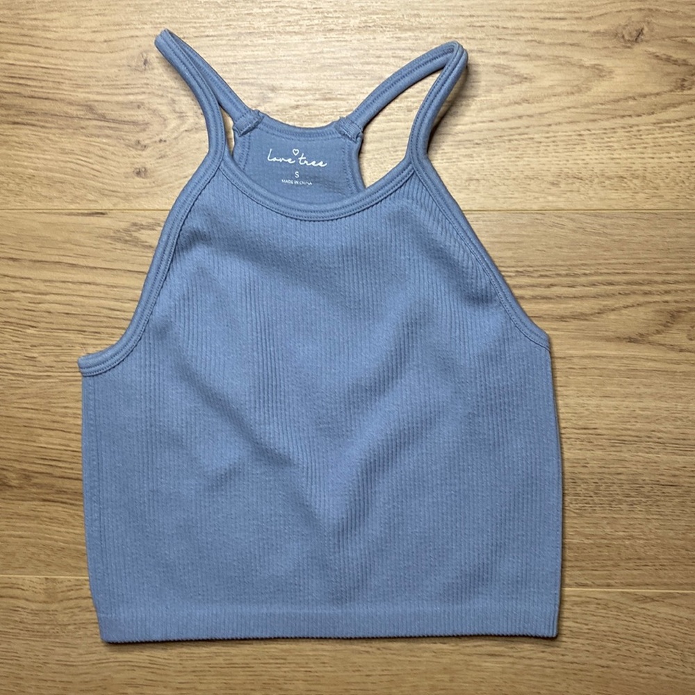 HII!! These tops are from a woman’s clothing store called “XI”